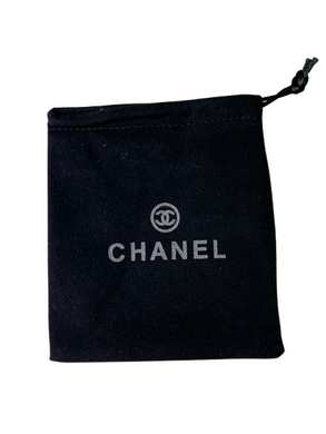 Фото Дизайнерский брелок-подвеска &laquo;Кукла в очках&raquo; от Chanel White Gold