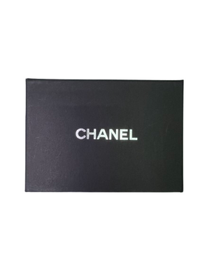 Фото Дизайнерский брелок-подвеска &laquo;Кукла в очках&raquo; от Chanel White Gold